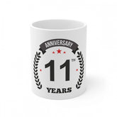 White ceramic 11th anniversary printed coffee mug (11oz, 330ml) on table